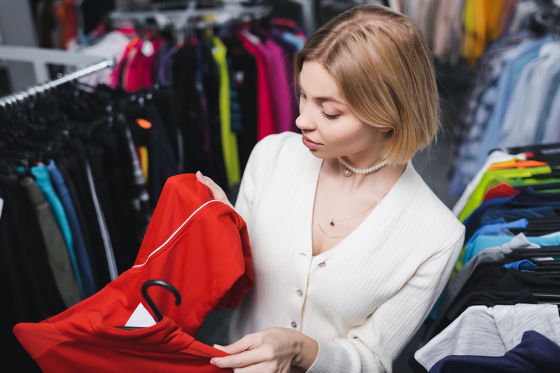 Woman Looking at Vintage Clothing Shopping