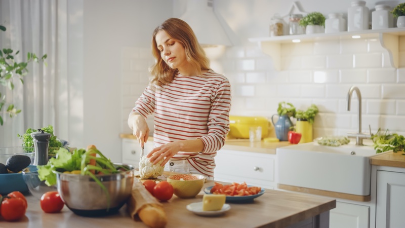 Woman Striped Sweater Cooking Kitchen