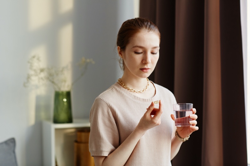 Woman Vitamin Capsule Water Glass