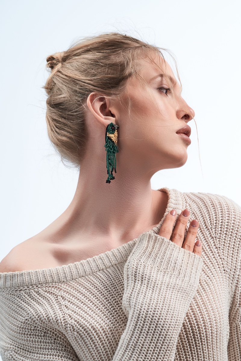 Woman Wearing Beaded Earrings