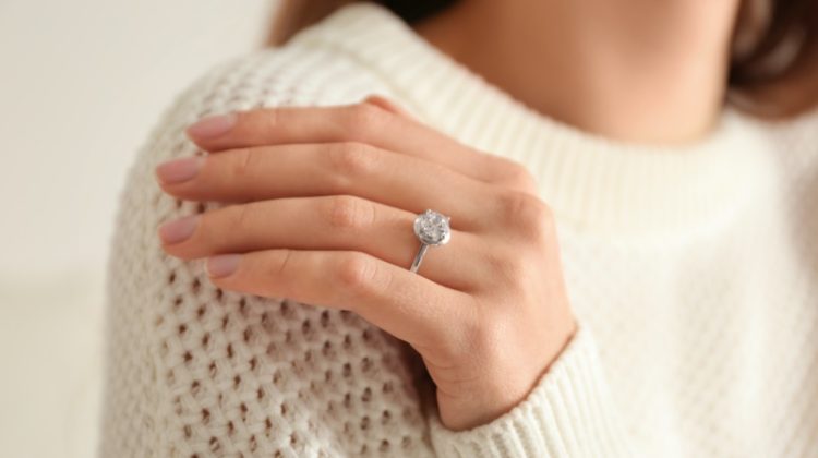 Closeup Womens Engagement Ring Sweater