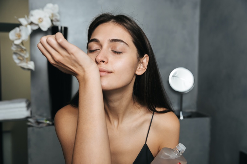 Model Smelling Fragrance Perfume