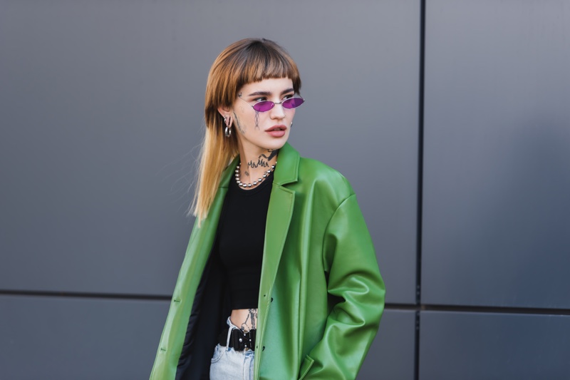 Tattooed Woman Sunglasses Green Leather Jacket Crop Top