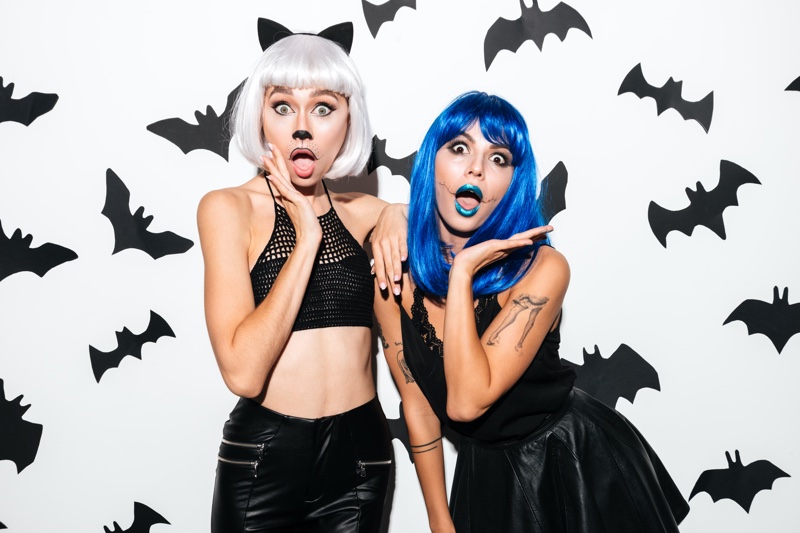 Two Women Halloween Costumes Wigs Bats