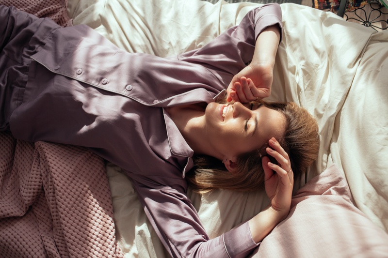 Woman Comfortable Purple Pajamas Bed