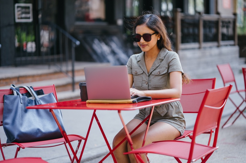 Woman Laptop Outside Stylish Table