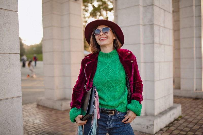 Woman Velvet Jacket Green Sweater Hat Sunglasses