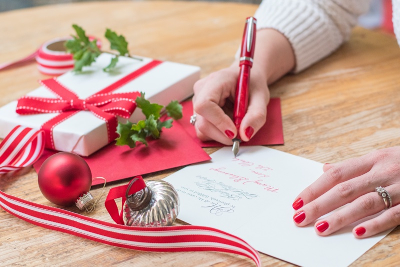 Woman Writing Christmas Card Pen