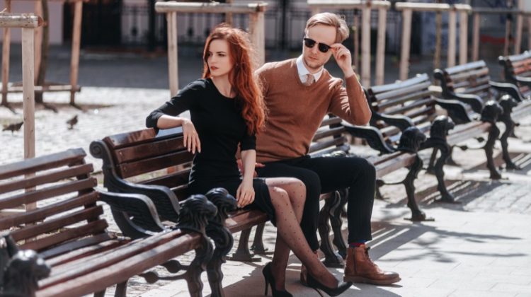 7 Blind Date Essentials for Women Couple Well Dressed Date Bench Black Dress Heels