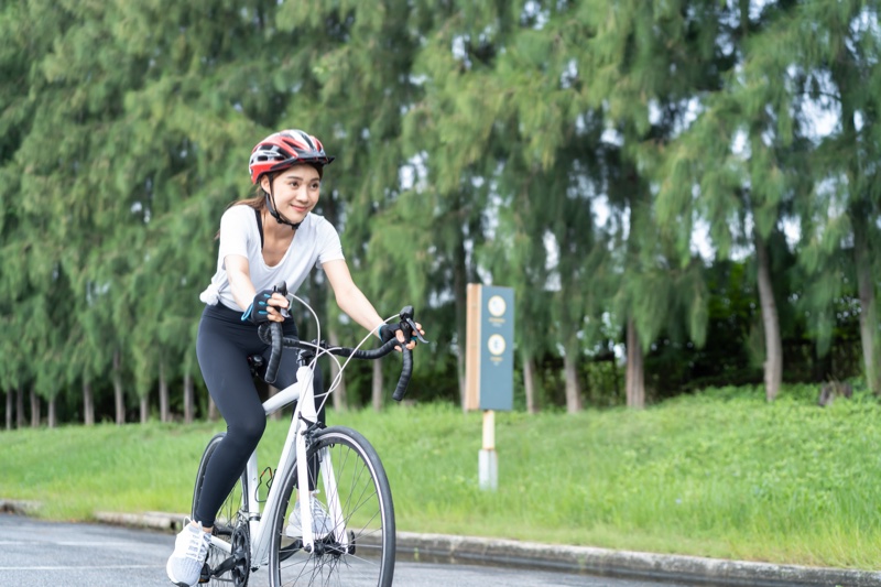 Happy Asian Woman Riding Bike Helmet T-Shirt Leggings