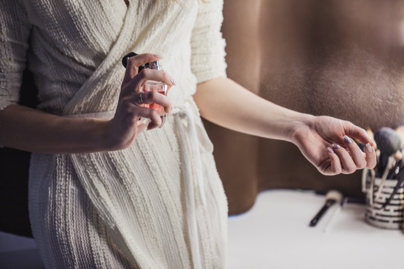 Lady Spraying Perfume