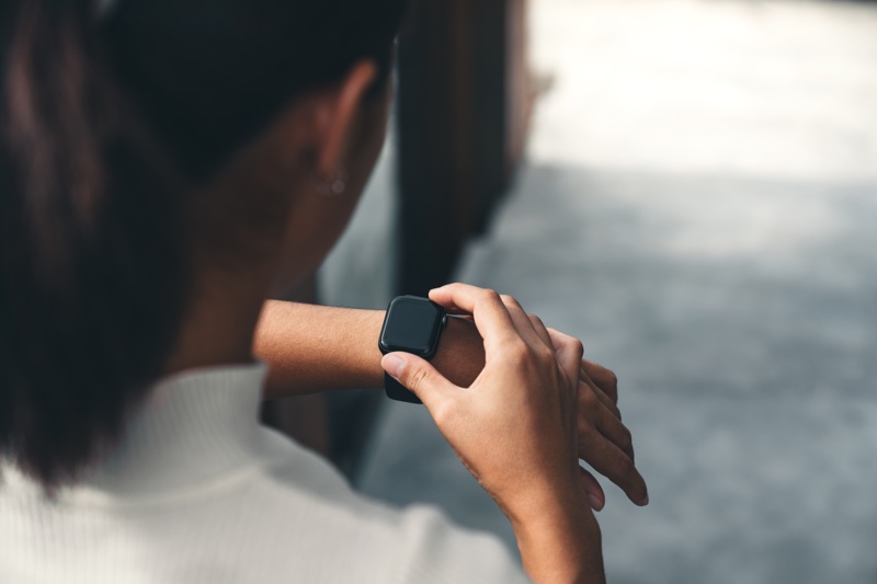 Woman Checking Smartwatch Cropped