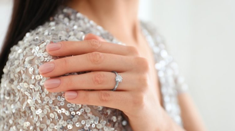 Woman Sequins Wearing Engagement Ring