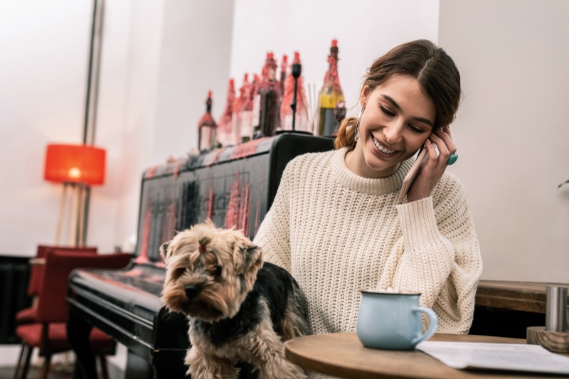 Woman Sitting Dog Phone