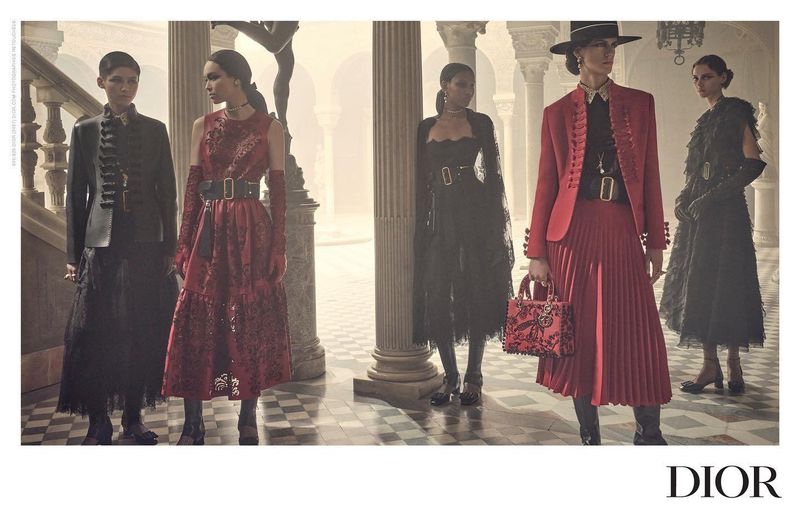 A color palette of black and red stands out in the Dior cruise 2023 campaign.