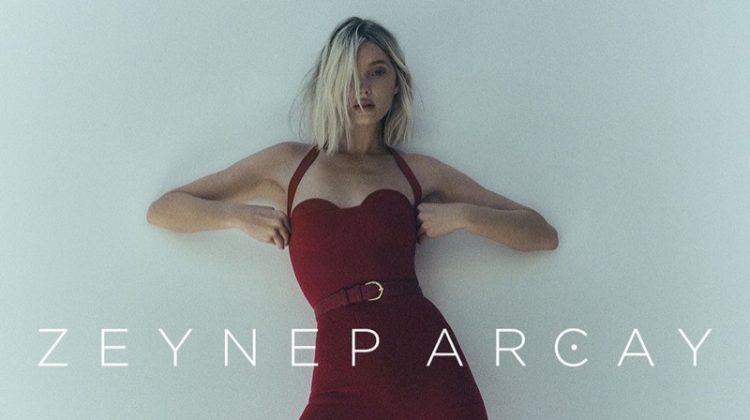 Dressed in a red top and pants, Elsa Hosk fronts Zeynep Arçay resort 2023 campaign.