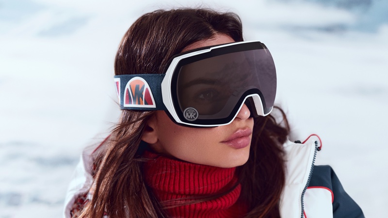 Emily Ratajkowski wears snow goggles for Michael Kors x Ellesse Ski 2022 campaign.
