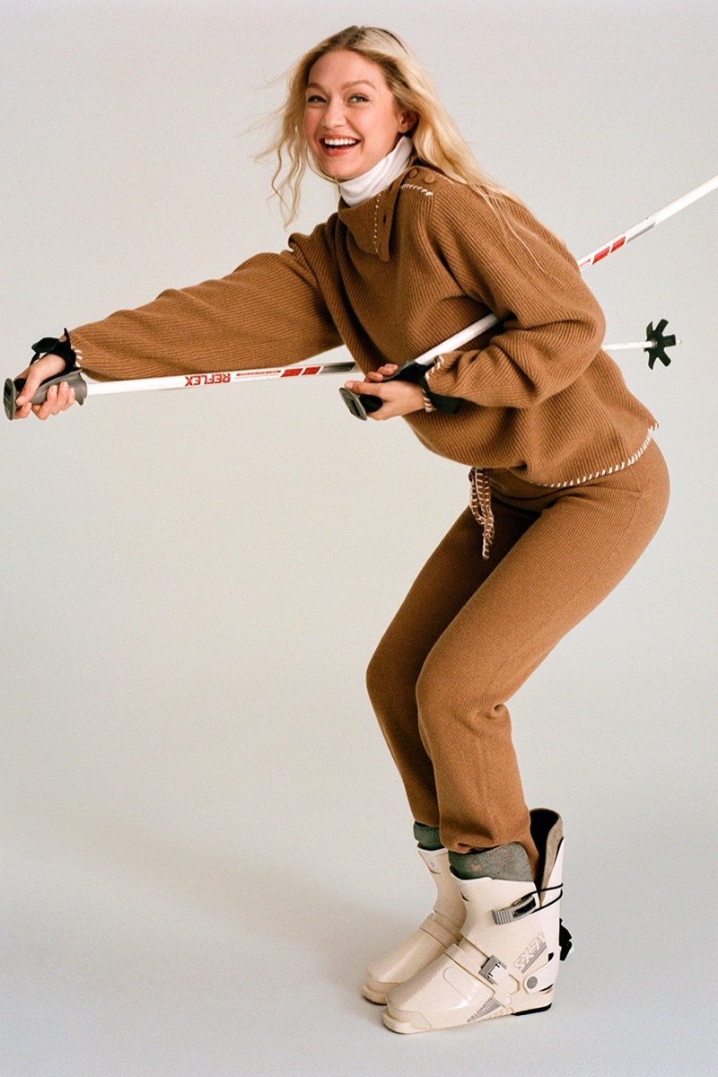 Posing with skis, Gigi Hadid fronts Guest in Residence Ski Lodge November 2022 collection.