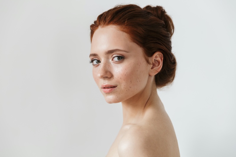 Model Bun Natural Makeup Red Hair