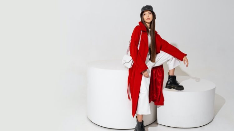 Model Red Coat White Pants Boots Outfit