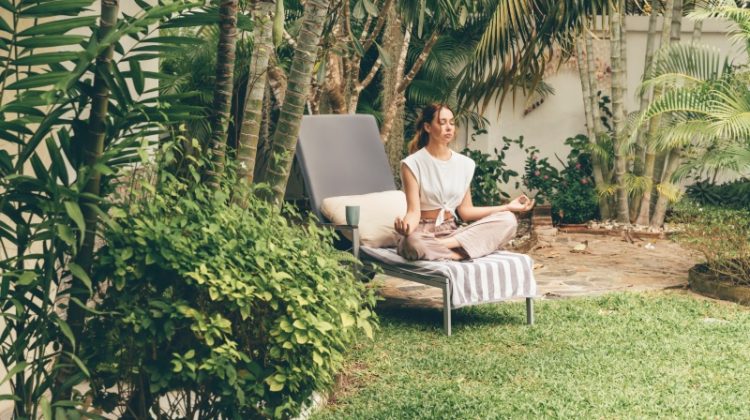 sunlounger woman small backyard