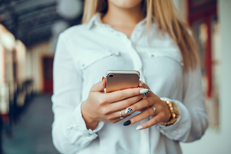 Woman Phone Manicured Nails