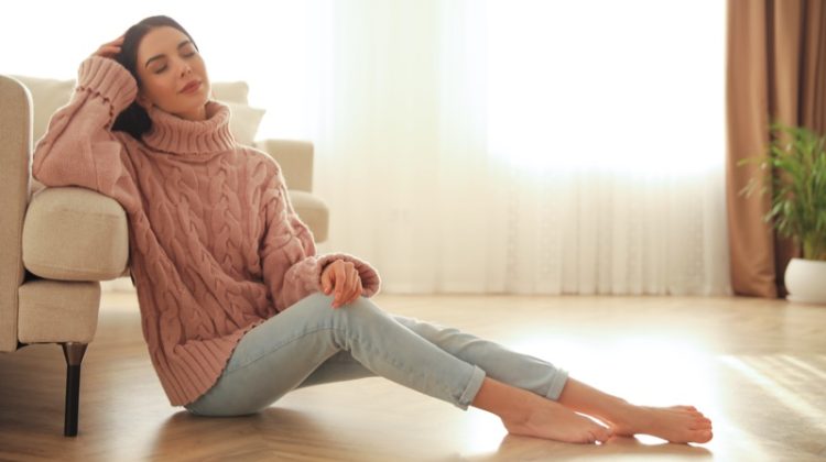 Woman Pink Sweater Lounging Home Sunlight