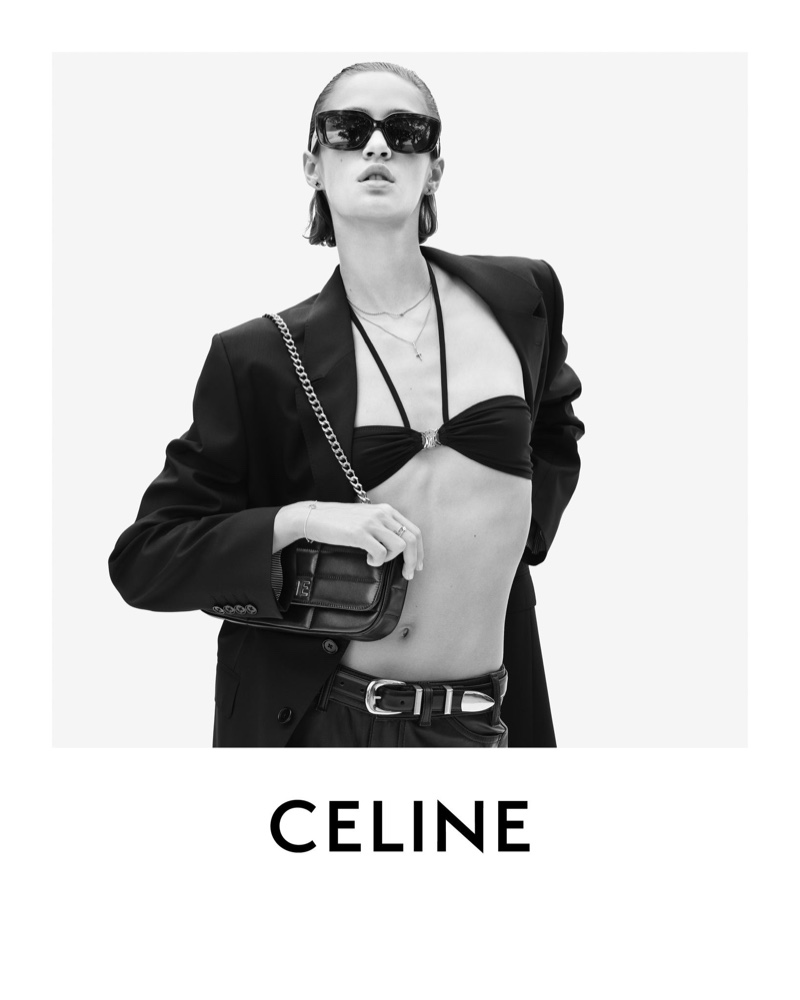 Quinn Mora models Celine classic jacket, Triomphe bikini top, and long chain shoulder bag in matelassé monochrome.