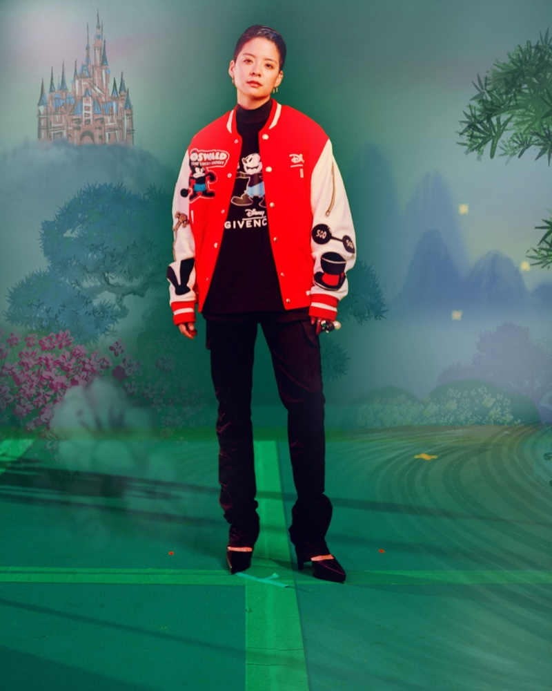 Amber Liu wears red varsity jacket in Disney x Givenchy Lunar New Year 2023 campaign.