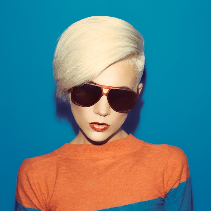 fashionable woman short hair sunglasses colorful