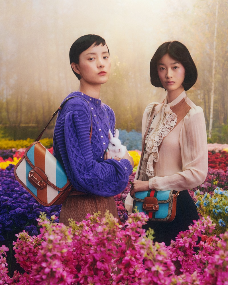 Emma Pei and Ruiqi Jiang pose for Gucci Lunar New Year 2023 campaign.