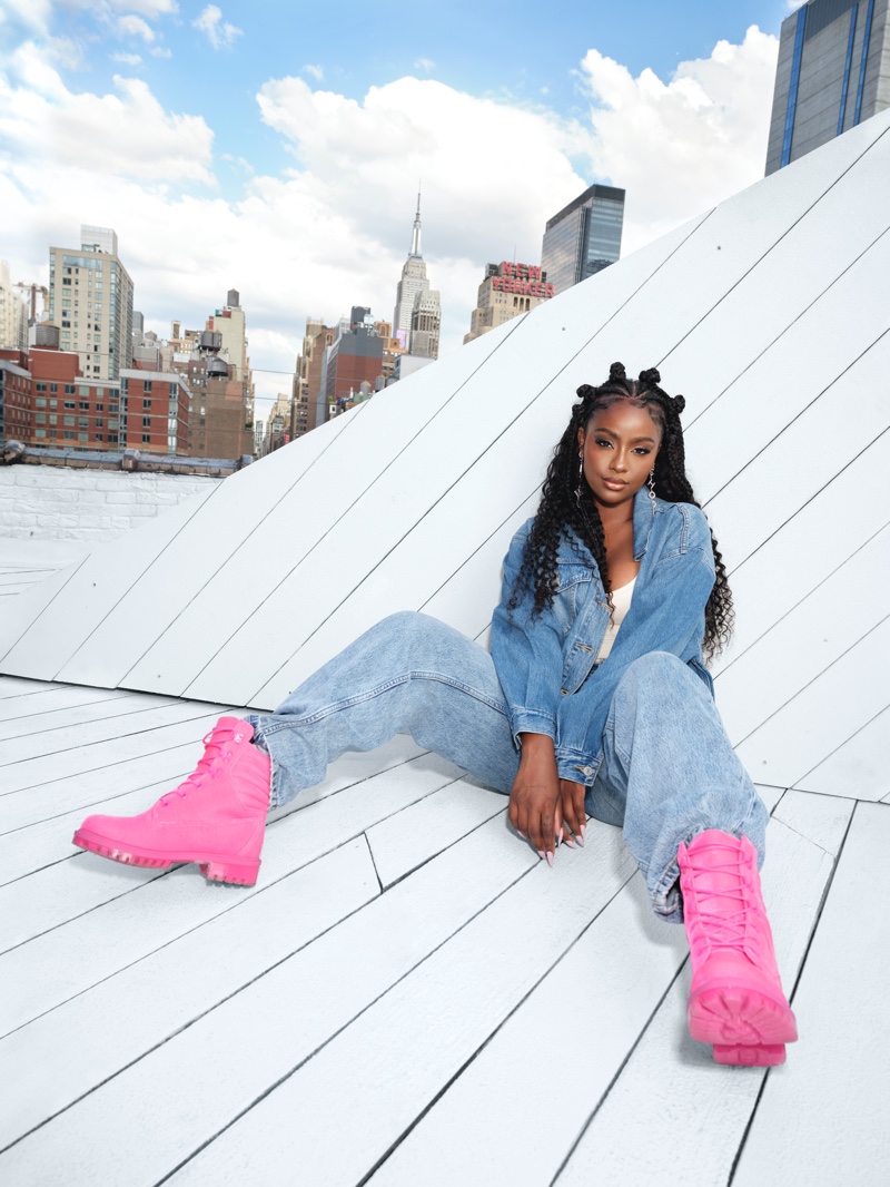 Rocking pink boots, Justine Skye fronts Jimmy Choo x Timberland 2022 capsule collection campaign.