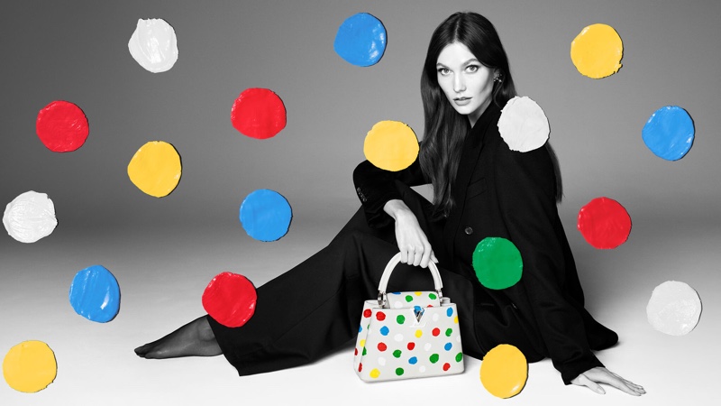 Karlie Kloss appears in Louis Vuitton x Yayoi Kusama 2023 campaign.