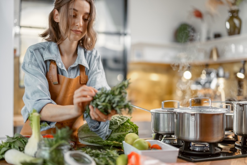 woman cooking healthy
