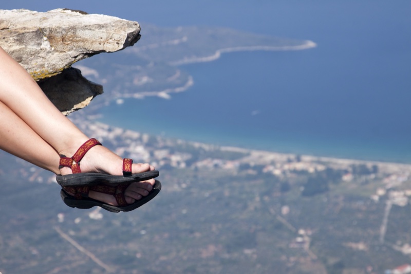woman hiking sandals cliff