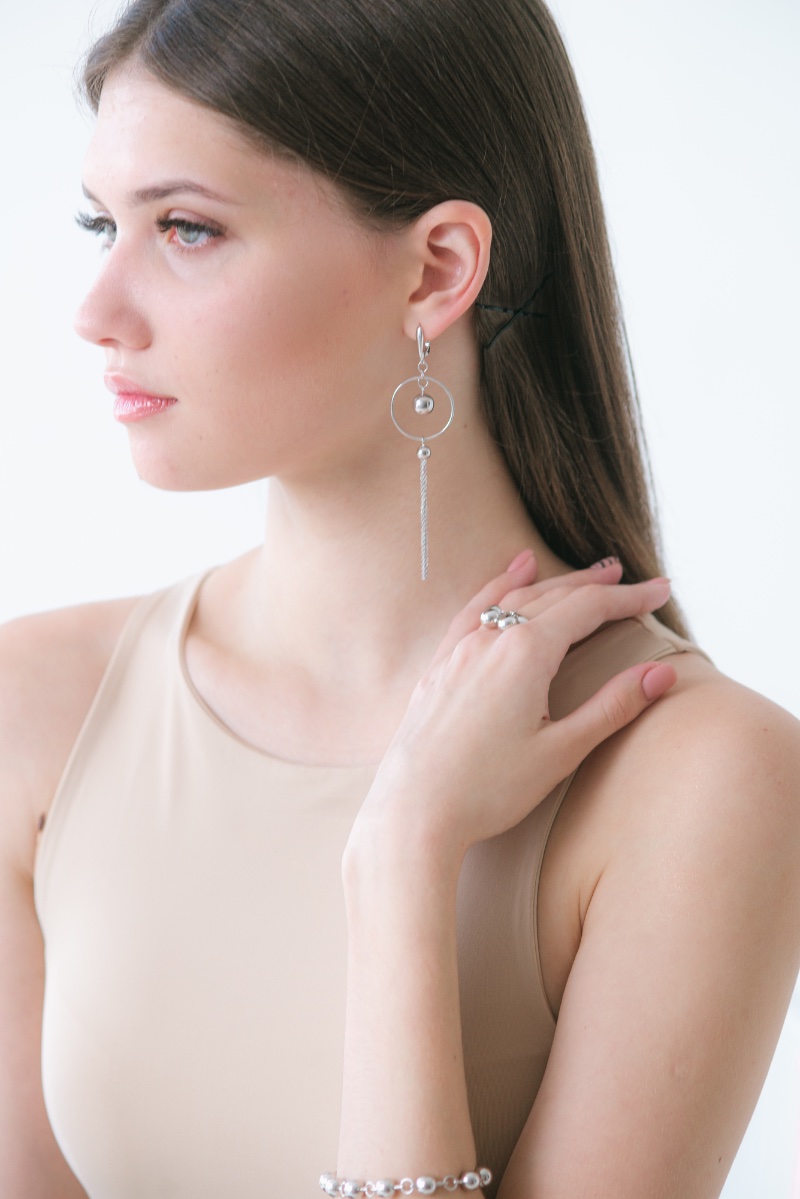 woman silver jewelry ring earring