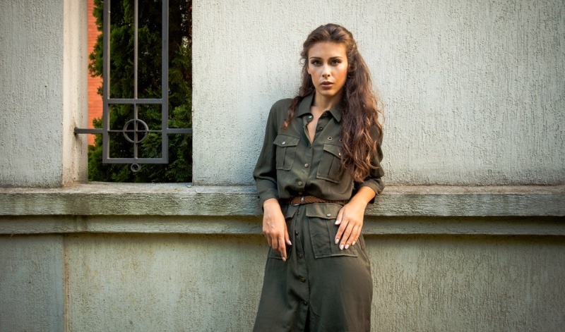 woman wearing military inspired dress