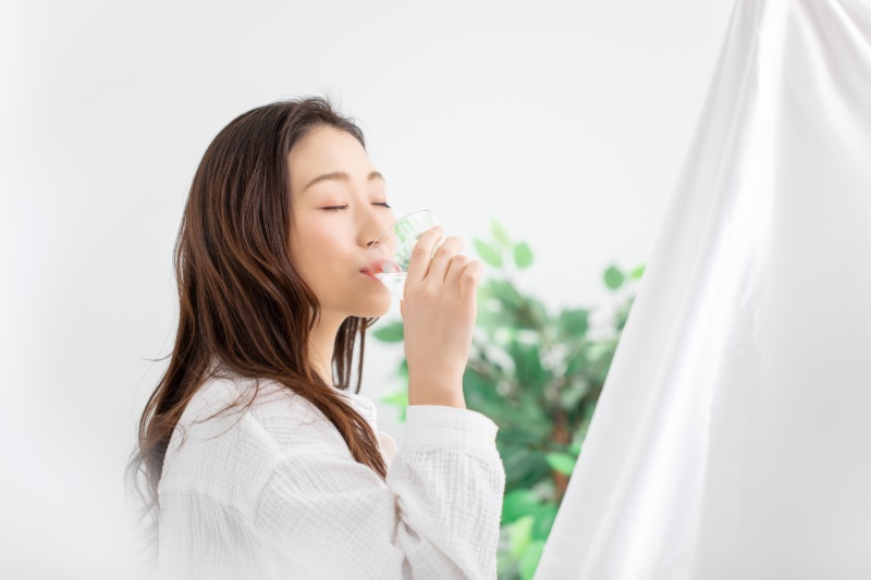 Asian Woman Drinking Water