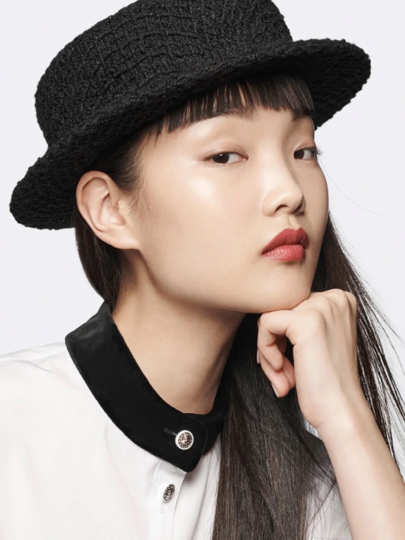 Bomi Youn poses in Chanel Rouge Allure Velvet Lipstick in shade 64 Éternelle.