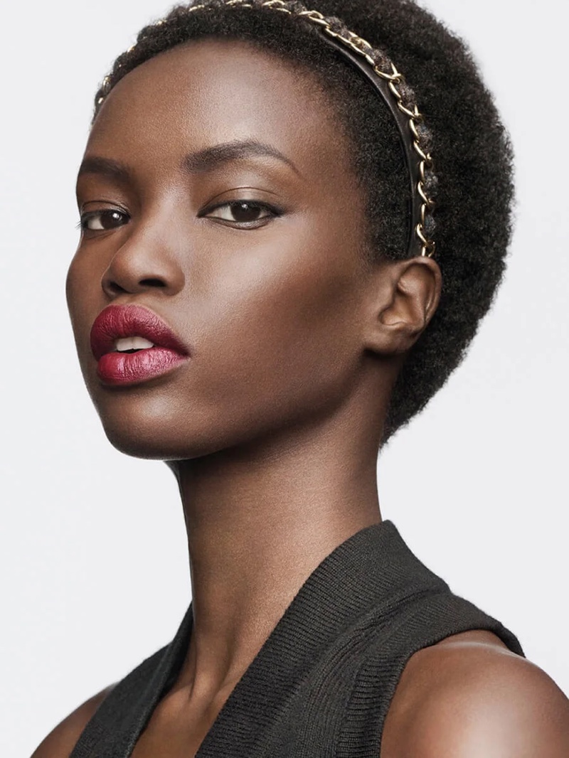 Anok Yai models Chanel Rouge Allure Velvet Lipstick in shade 72 Mystérieuse.