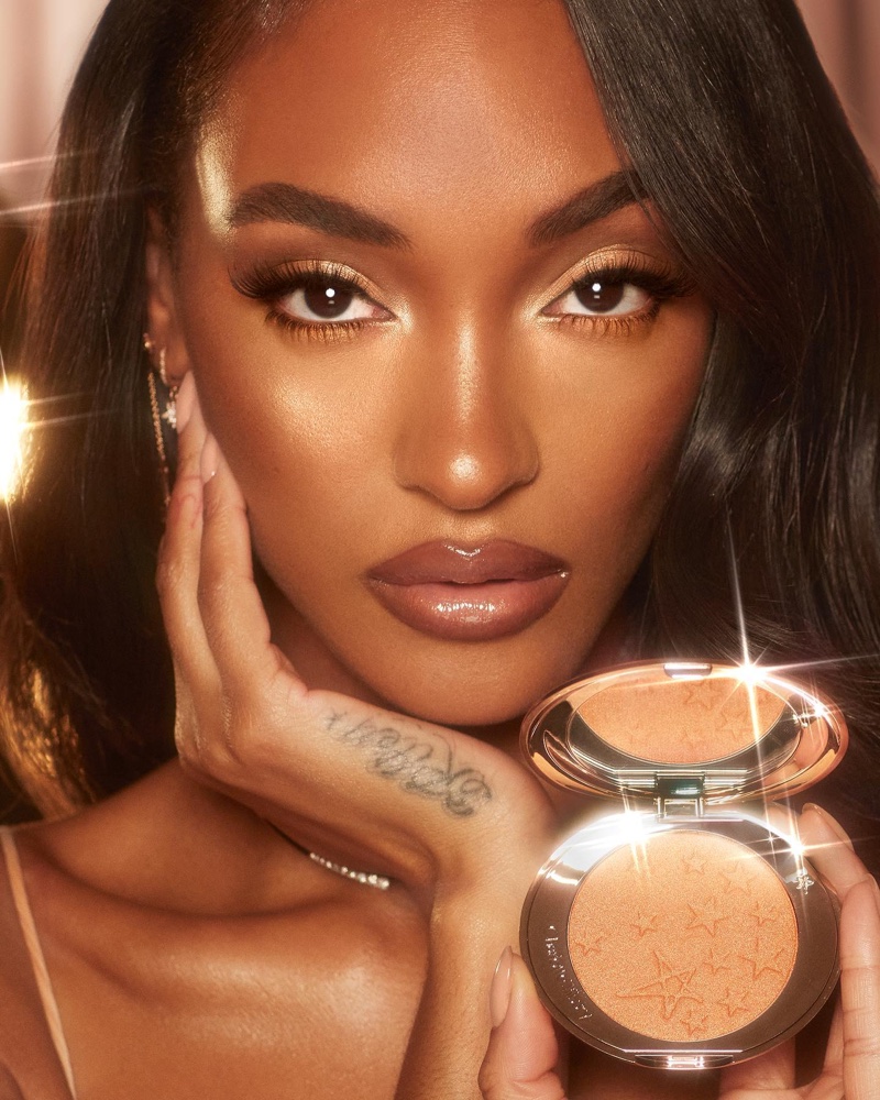 Jourdan Dunn dazzles in Charlotte Tilbury Hollywood Glow Glide Face Architect Highlighter campaign.