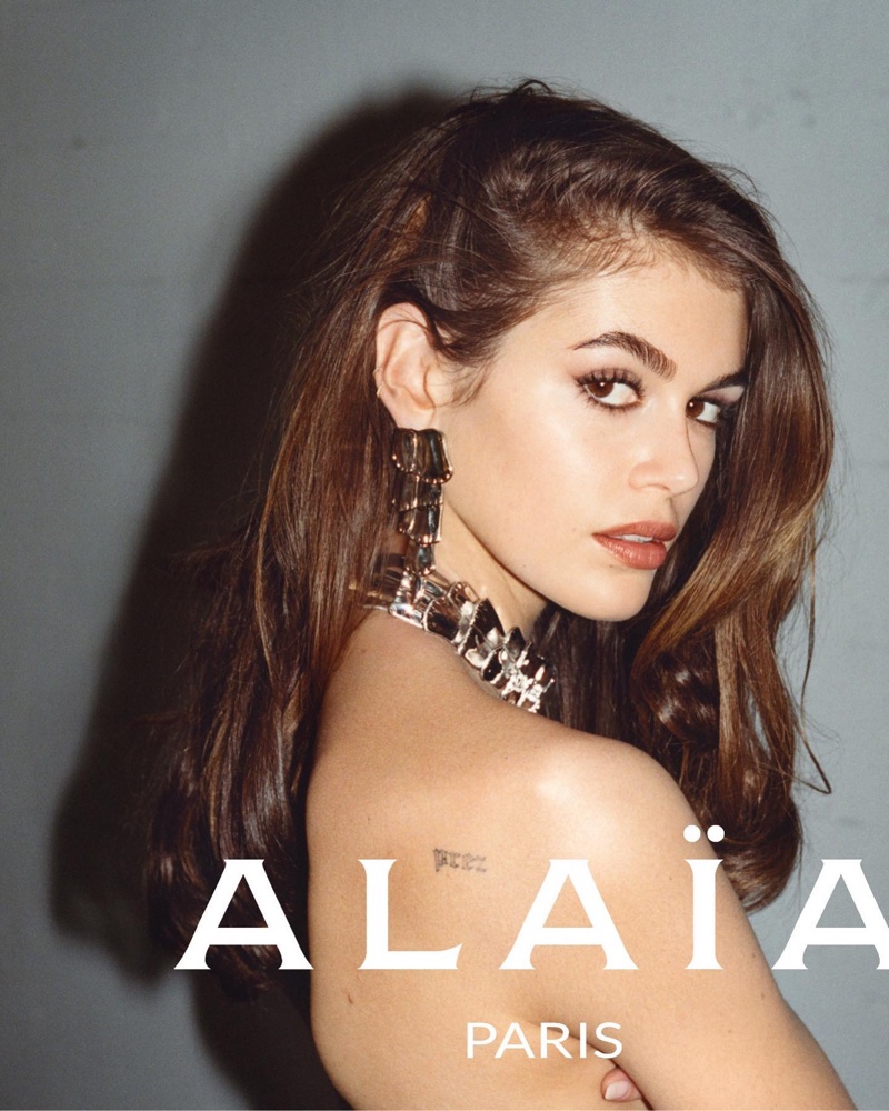 Ready for her closeup, Kaia Gerber models jewelry for Alaia spring 2023 campaign.