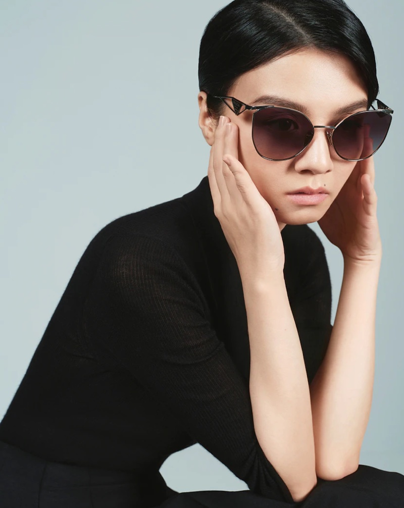 Actress Chun Xia wears oversized sunglasses in Prada Lunar New Year 2023 campaign.