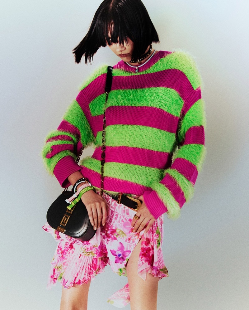 Steinberg models striped sweater in Versace resort 2023 cmapaign.