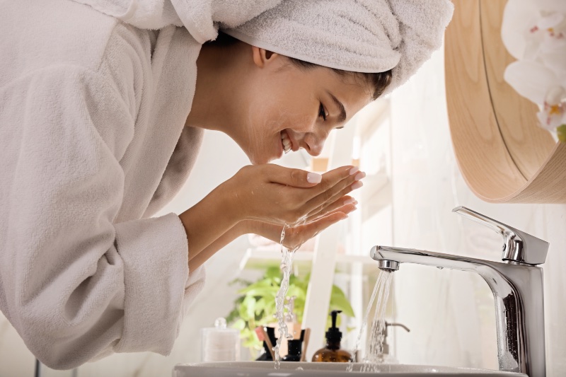 Woman Washing Face