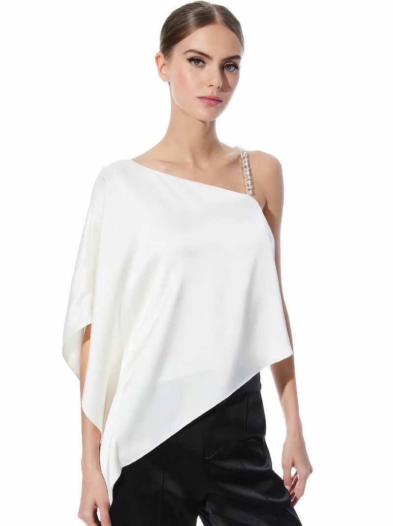 This one-strap top is available in two color options white (Ecru) and black. Image courtesy of Alice + Olivia