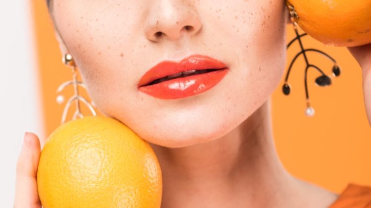 Woman Oranges Vitamins for Skin