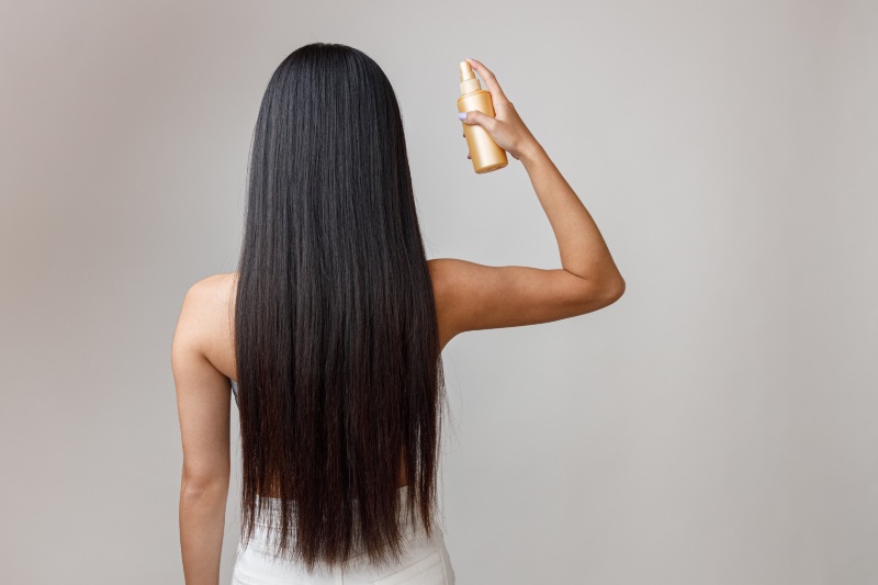 Woman Straight Hair Back Product Spray