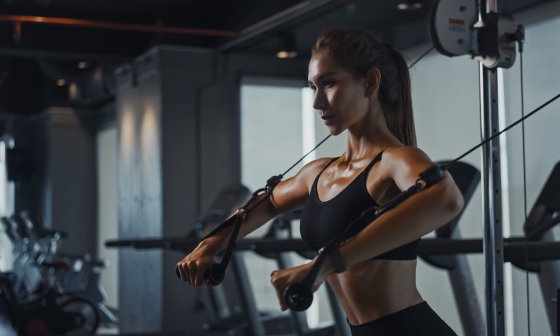 Woman Building Muscle Working Out