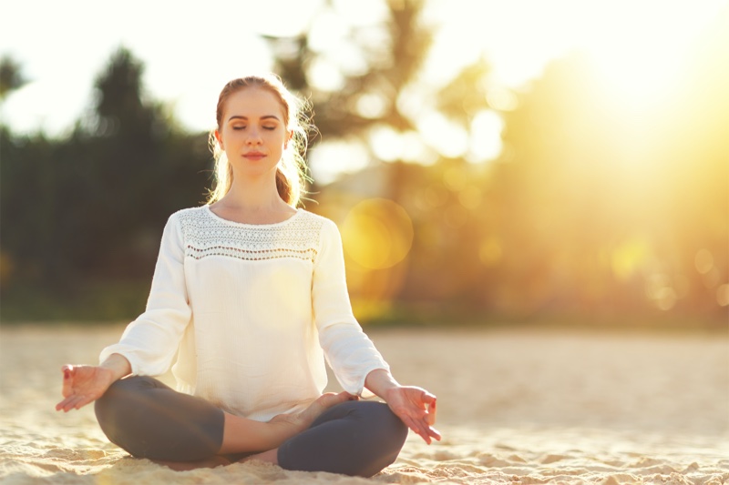 Woman Meditating White Blouse